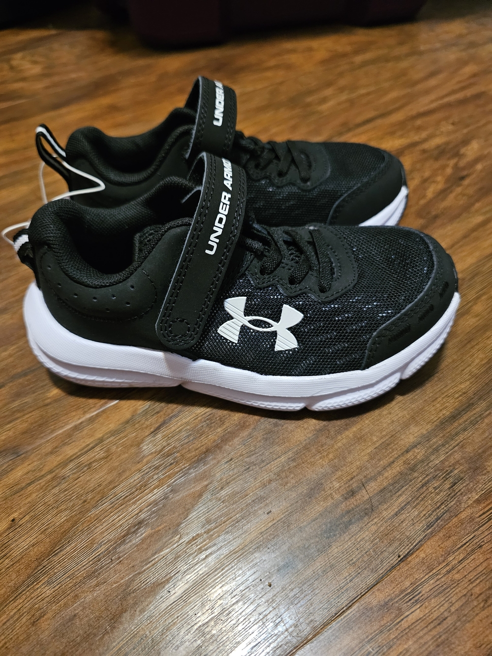 Under Armour Kids' Black Athletic Sneakers with White Logo